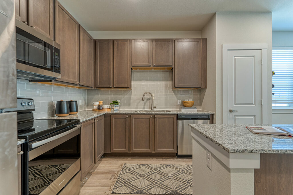 The Heart of Luxury Living - kitchen interior with designer tile backsplashes and spacious under-mount sinks
